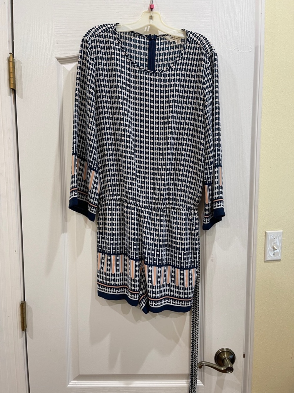 Navy and White Geometric Romper with Pink/peach Accents